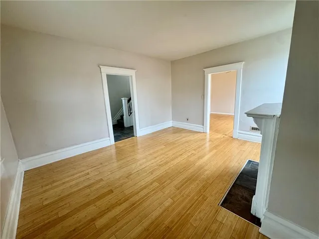 a view of a storage and utility room with a sink