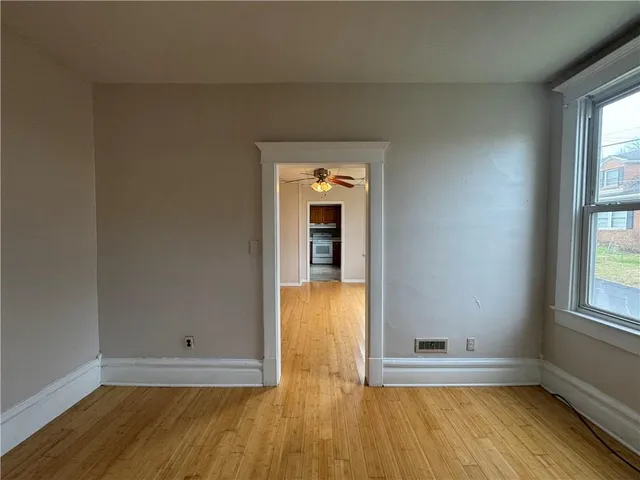 a bathroom with a sink a toilet and a shower