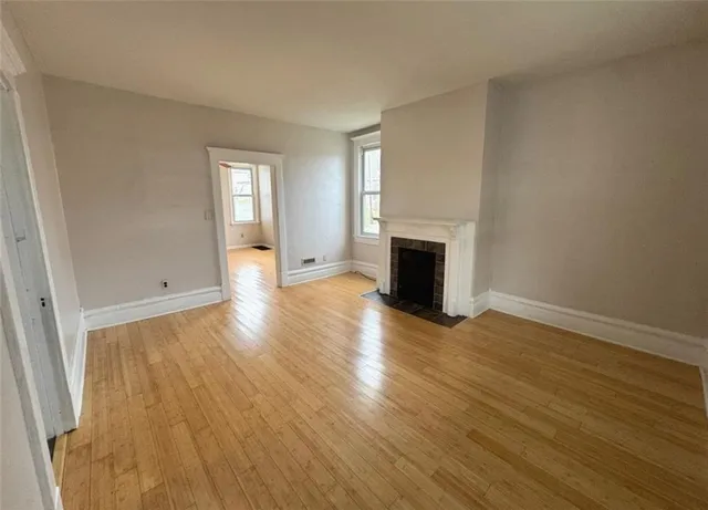 a kitchen with a stove a refrigerator and a sink