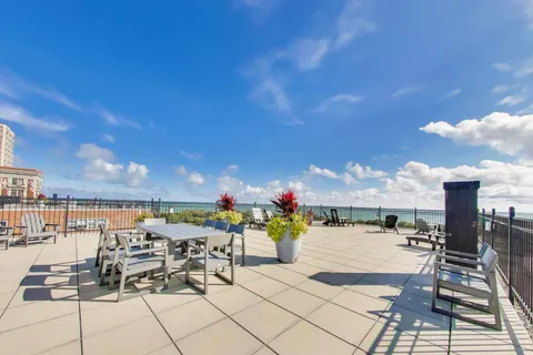 a view of a terrace with seating space