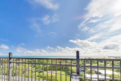 a view of a balcony with lake view