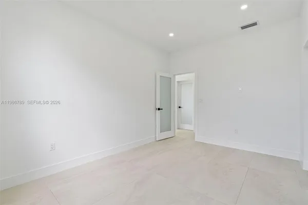 an empty room with windows