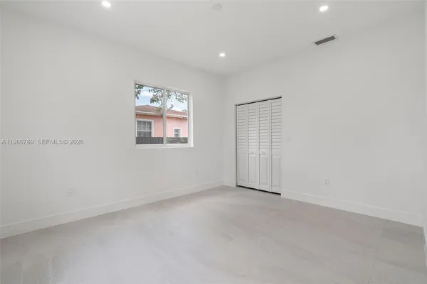 an empty room with windows