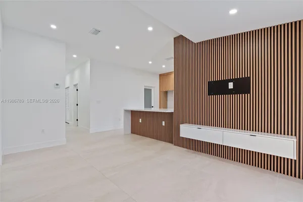 a view of a livingroom with a staircase