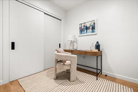 a room with a window and a table