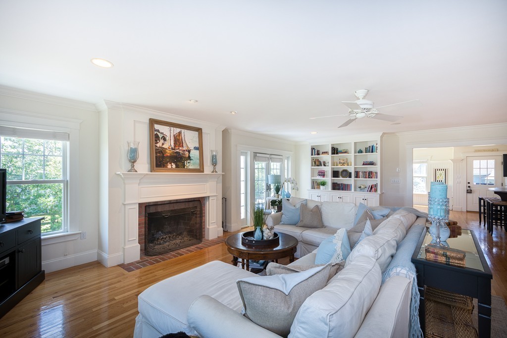160 Edward Foster Road Scituate, MA 02066 - Photo 13 of 30 a living room with furniture and a fireplace