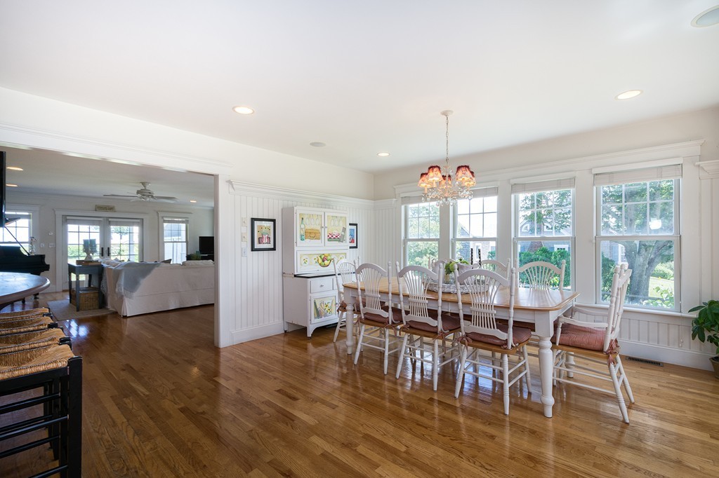 160 Edward Foster Road Scituate, MA 02066 - Photo 16 of 30 a view of a dining room with furniture window and wooden floor