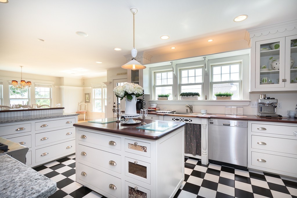 160 Edward Foster Road Scituate, MA 02066 - Photo 18 of 30 a kitchen with white cabinets and window