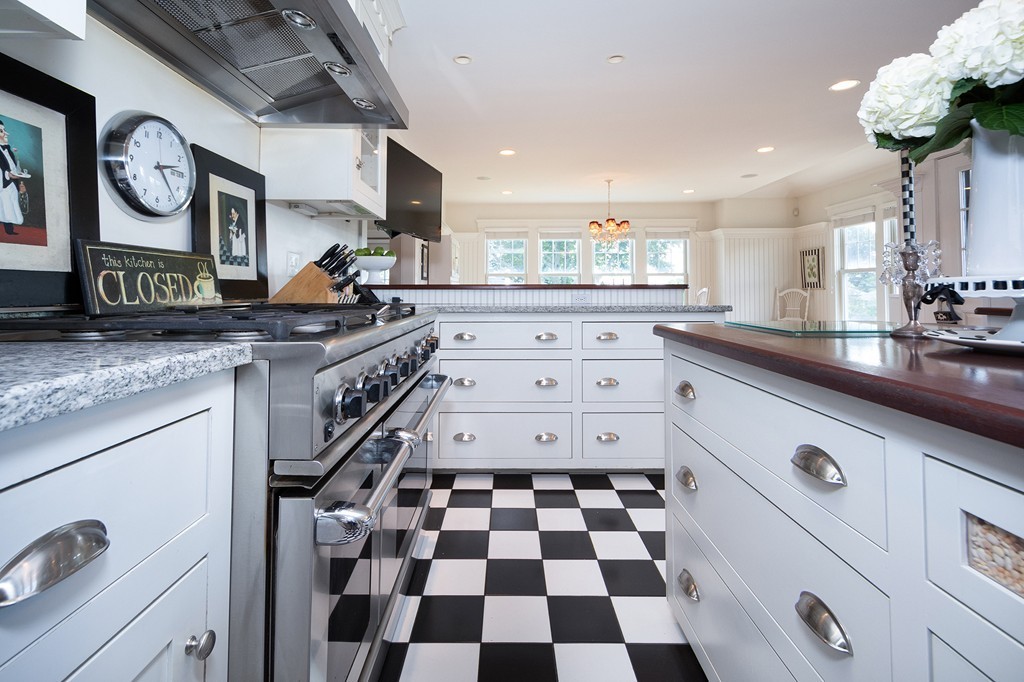 160 Edward Foster Road Scituate, MA 02066 - Photo 19 of 30 a kitchen with a sink a stove and cabinets