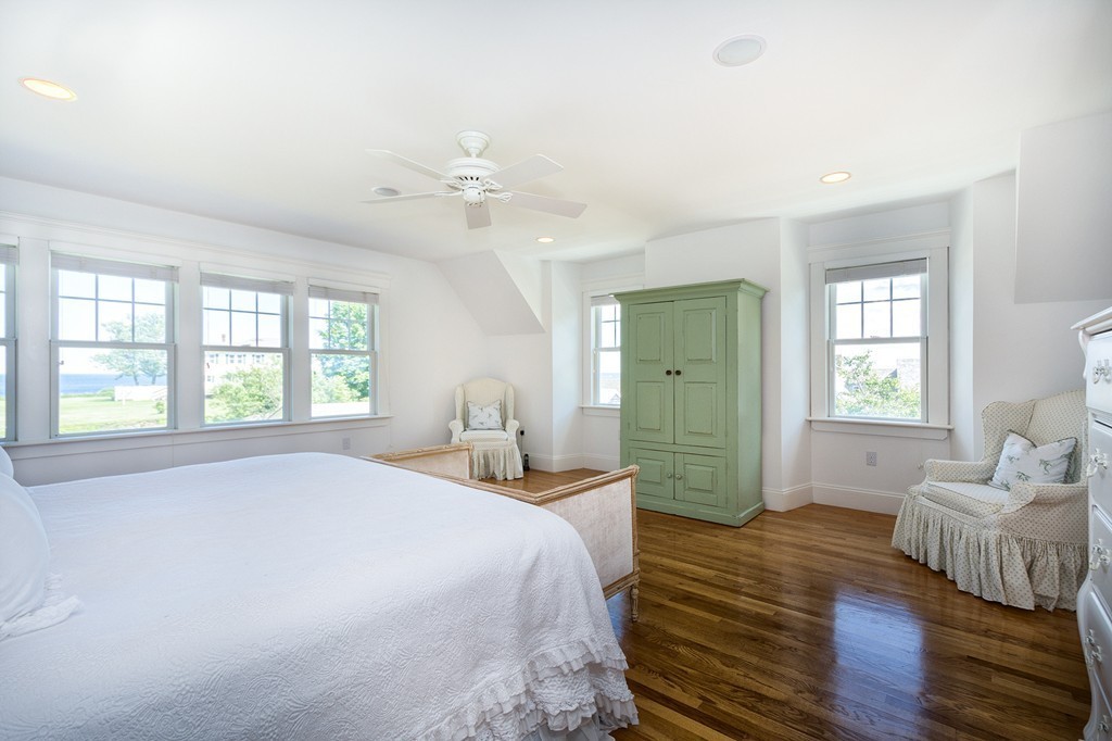160 Edward Foster Road Scituate, MA 02066 - Photo 21 of 30 a spacious bedroom with a bed and a large window