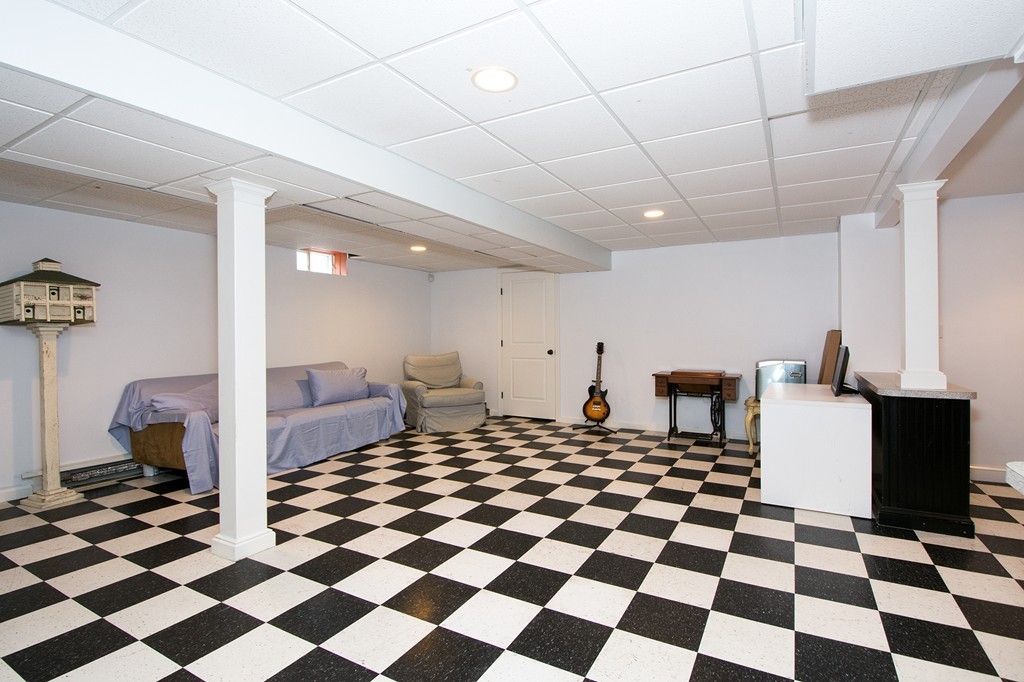 160 Edward Foster Road Scituate, MA 02066 - Photo 28 of 30 a room with a black white checkered floor and a black white checkered floor
