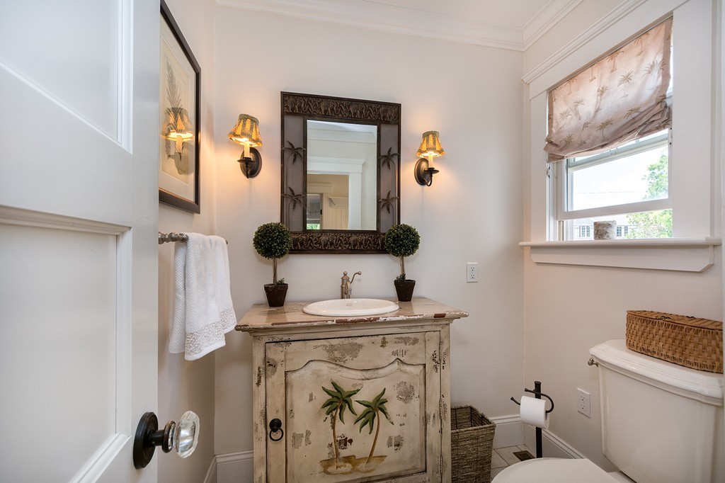 160 Edward Foster Road Scituate, MA 02066 - Photo 9 of 30 a bathroom with a toilet sink and mirror