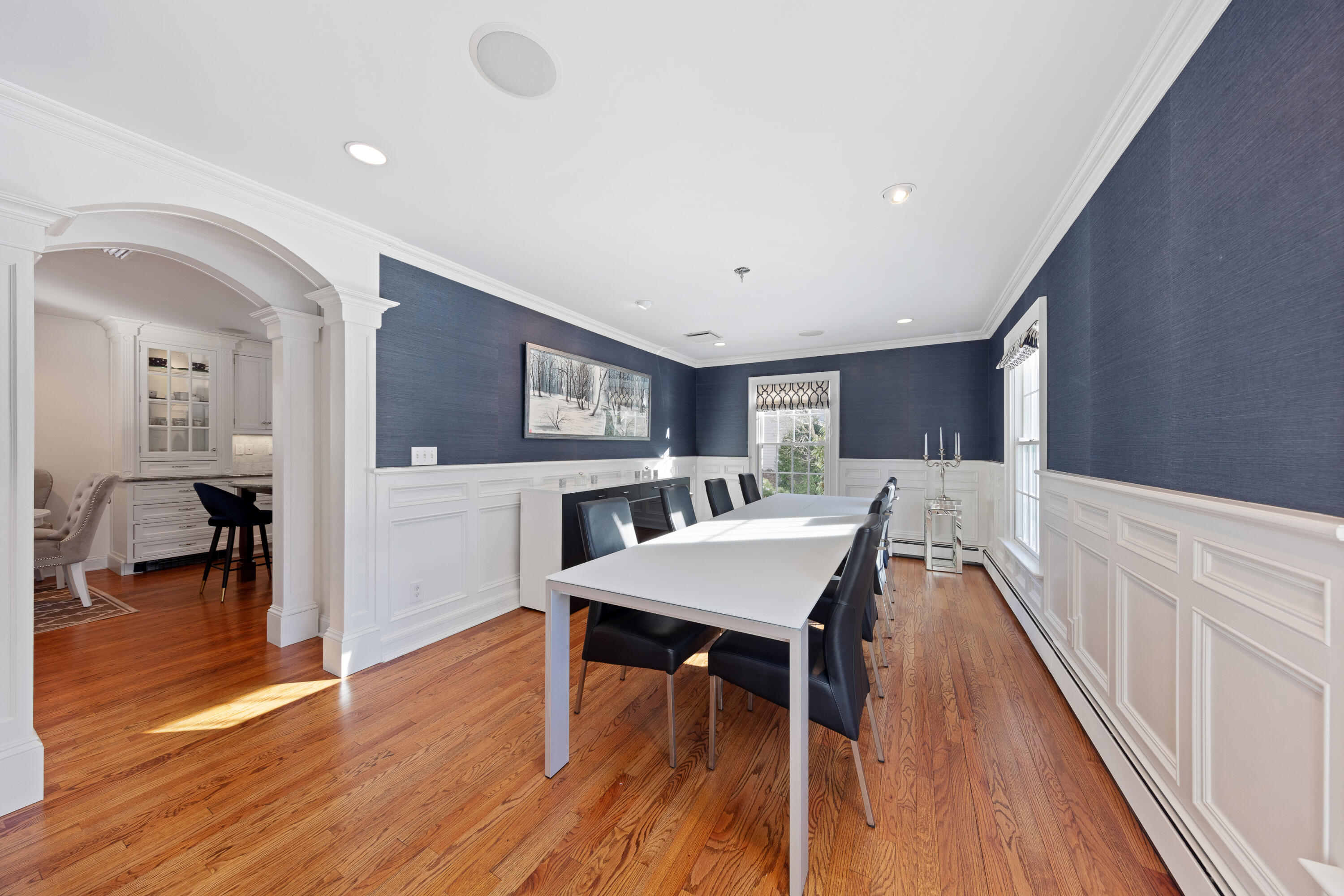 10 Chasmars Pond Road Darien, CT 06820 - Photo 13 of 32 a living room with furniture a dining table and wooden floor