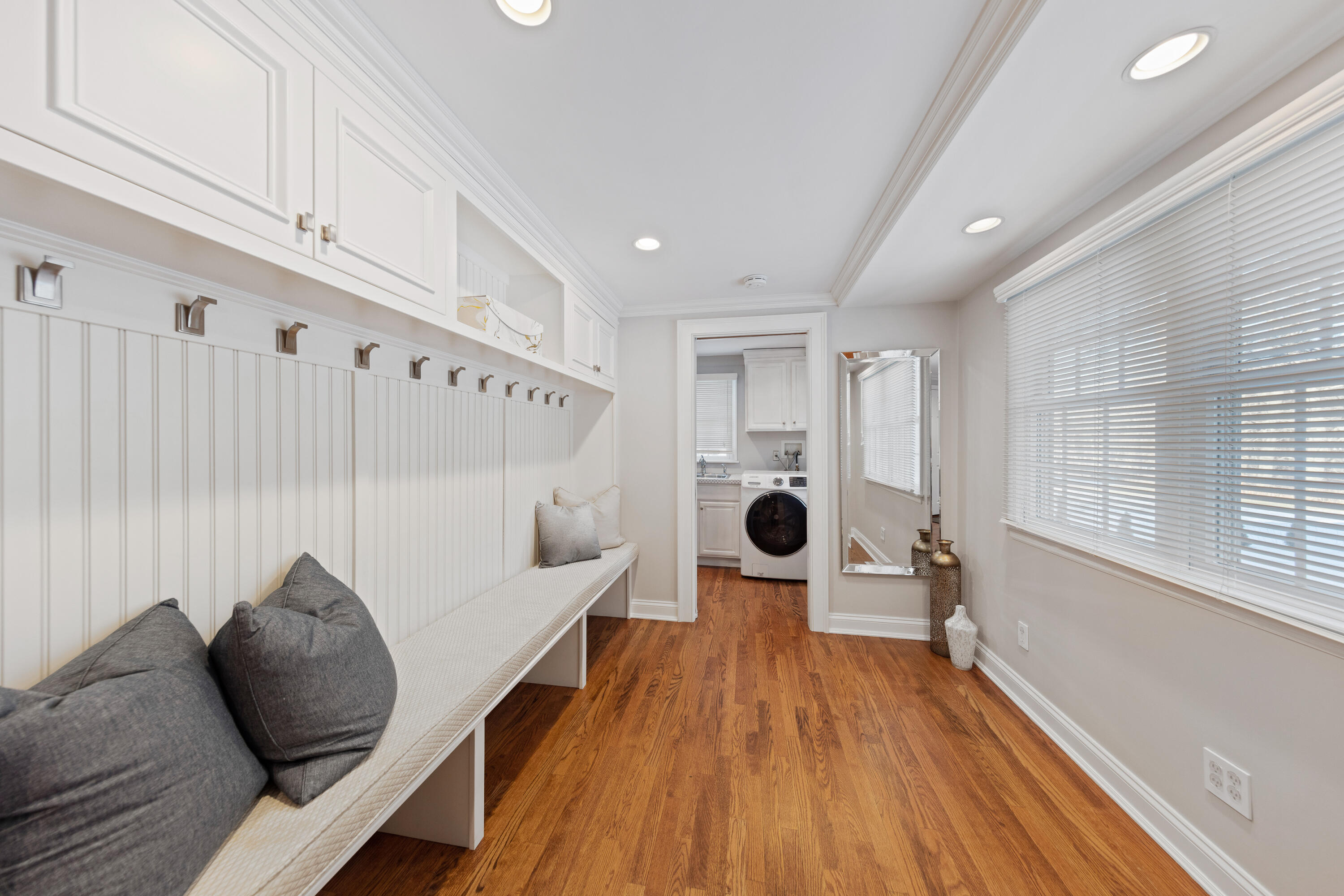 10 Chasmars Pond Road Darien, CT 06820 - Photo 15 of 32 a living room with furniture and a wooden floor