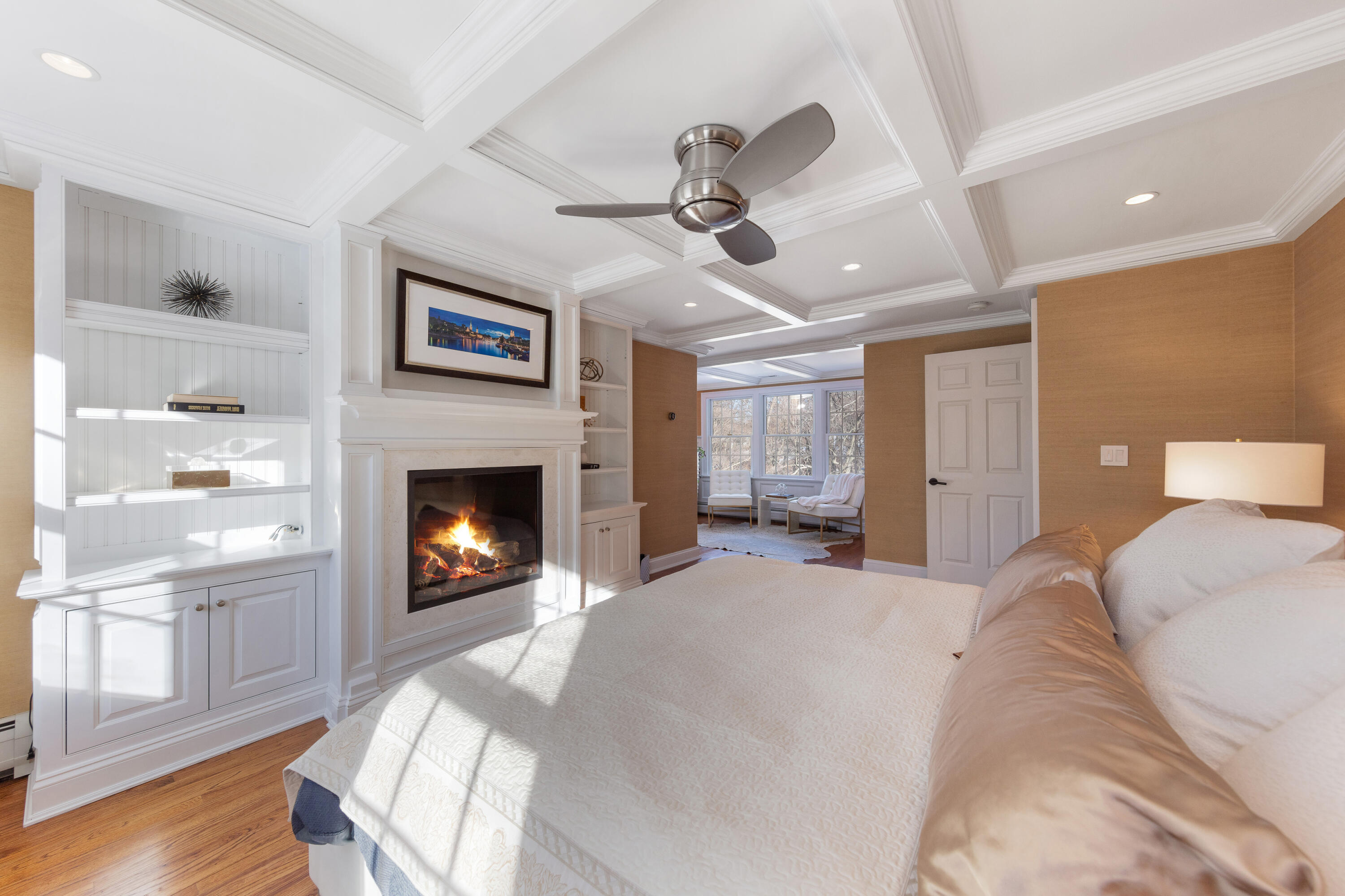 10 Chasmars Pond Road Darien, CT 06820 - Photo 17 of 32 a bed room with a bed and a fireplace