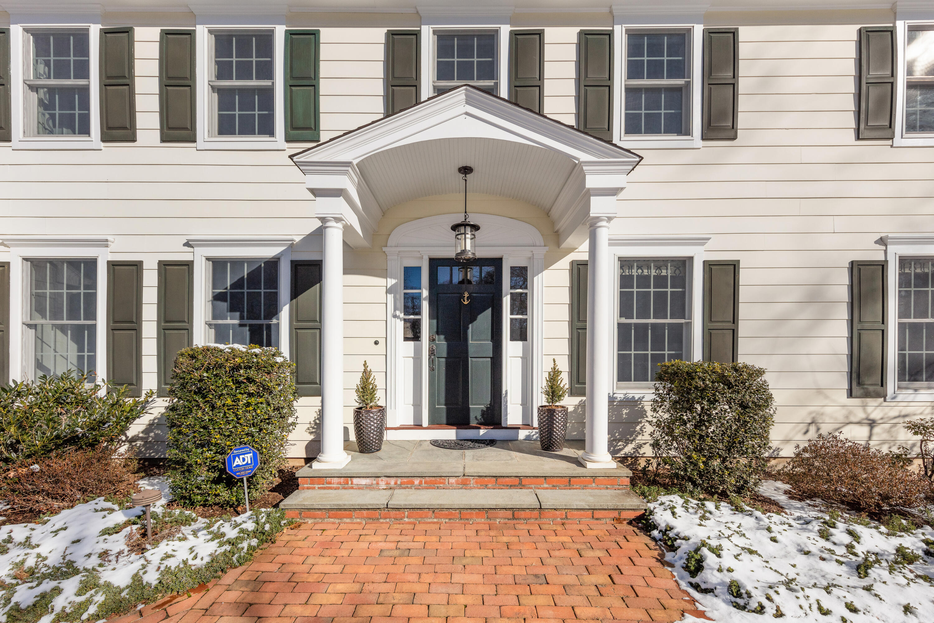 10 Chasmars Pond Road Darien, CT 06820 - Photo 2 of 32 a front view of a house