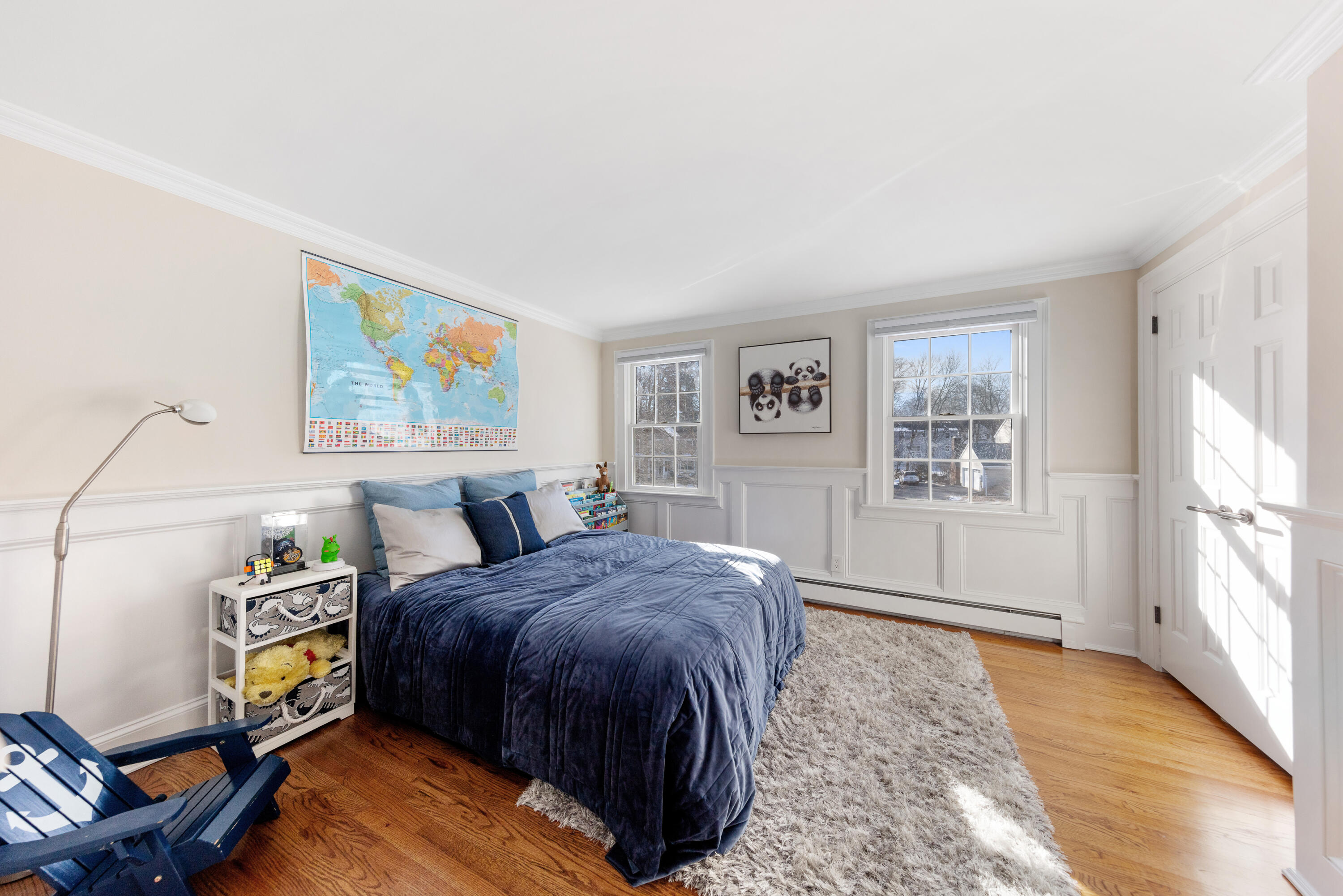 10 Chasmars Pond Road Darien, CT 06820 - Photo 21 of 32 a living room with a bed furniture and a window