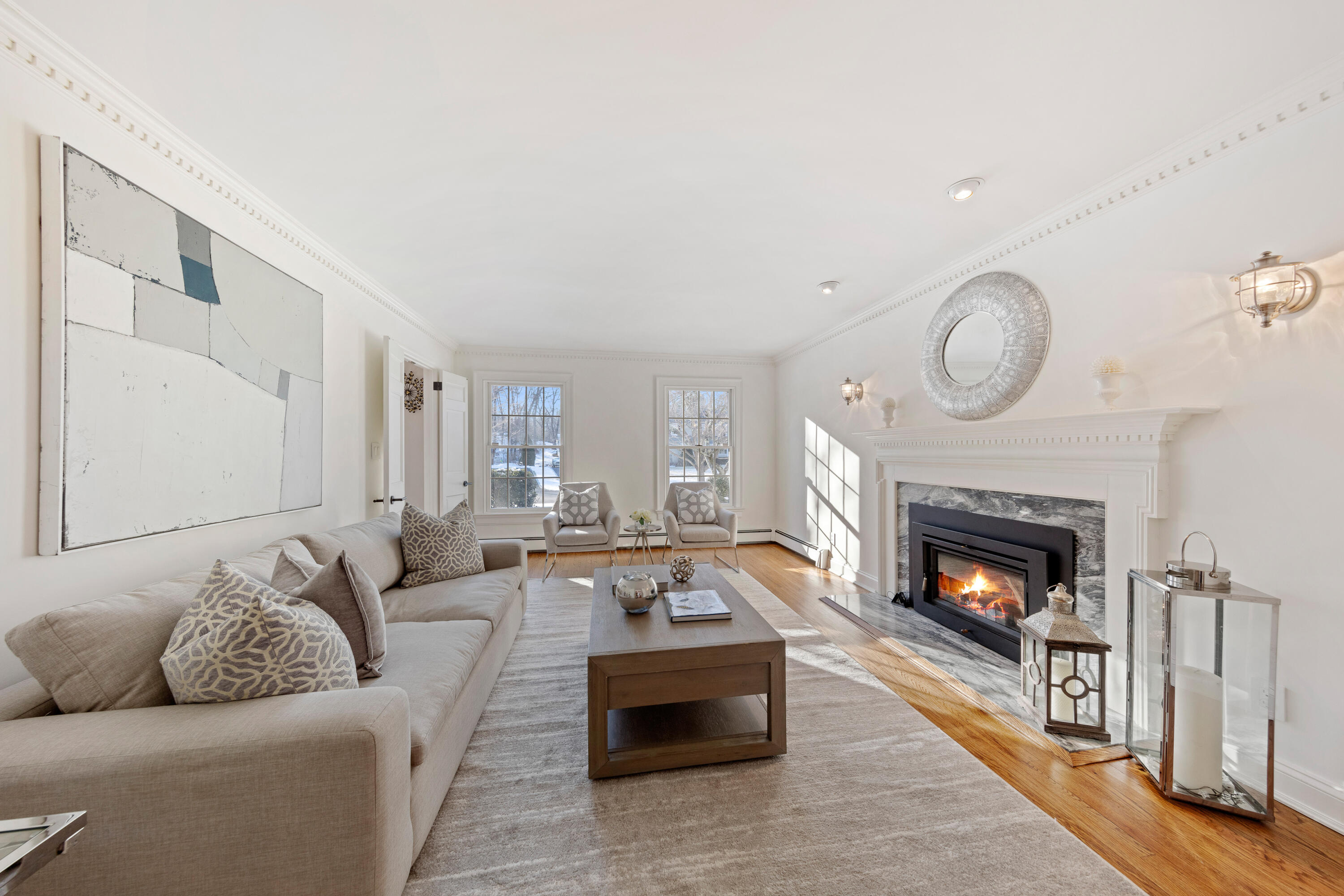 10 Chasmars Pond Road Darien, CT 06820 - Photo 4 of 32 a living room with furniture and a fireplace