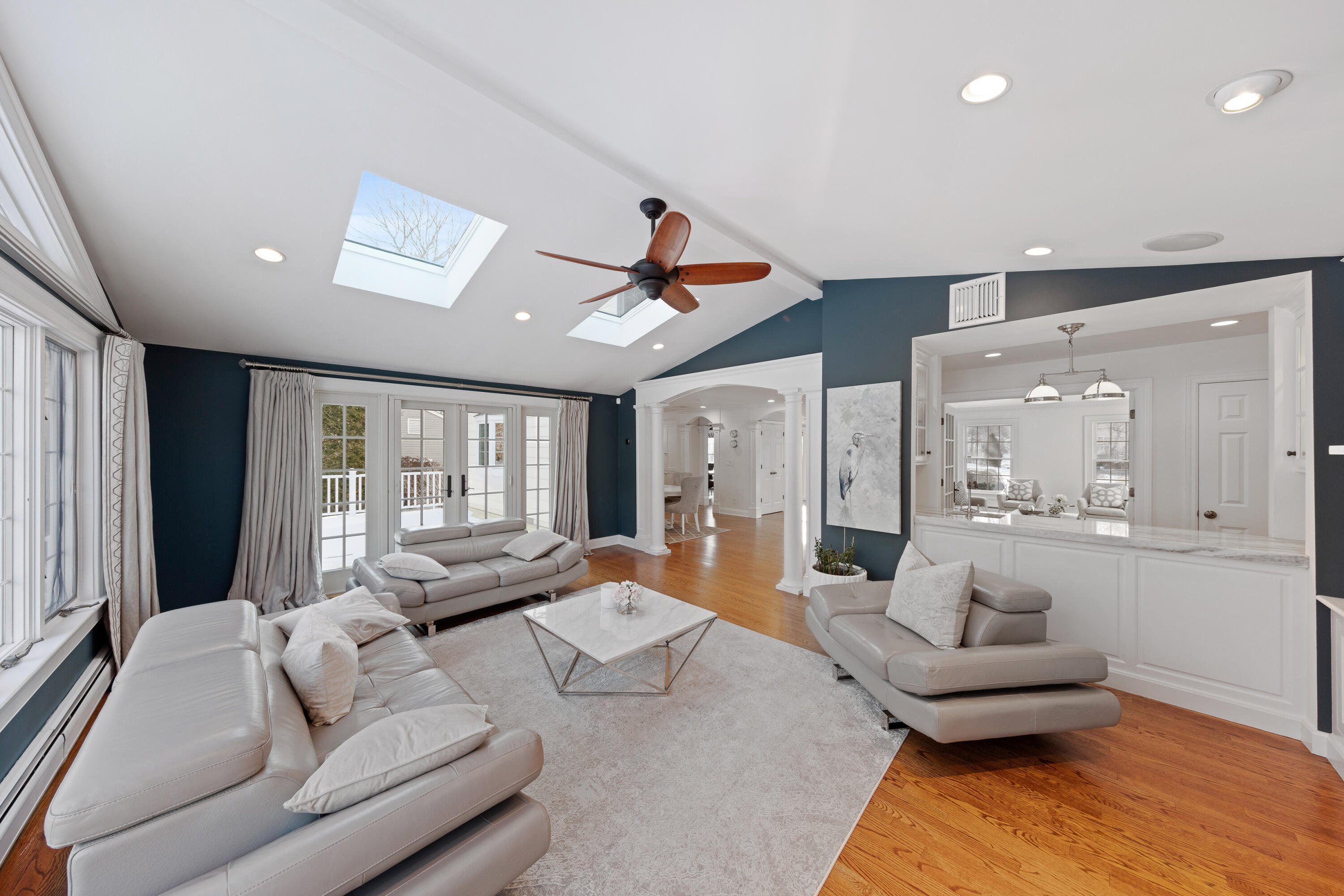 10 Chasmars Pond Road Darien, CT 06820 - Photo 8 of 32 a living room with furniture and a large window