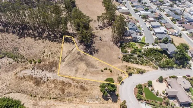 a black and white photo of a refrigerator