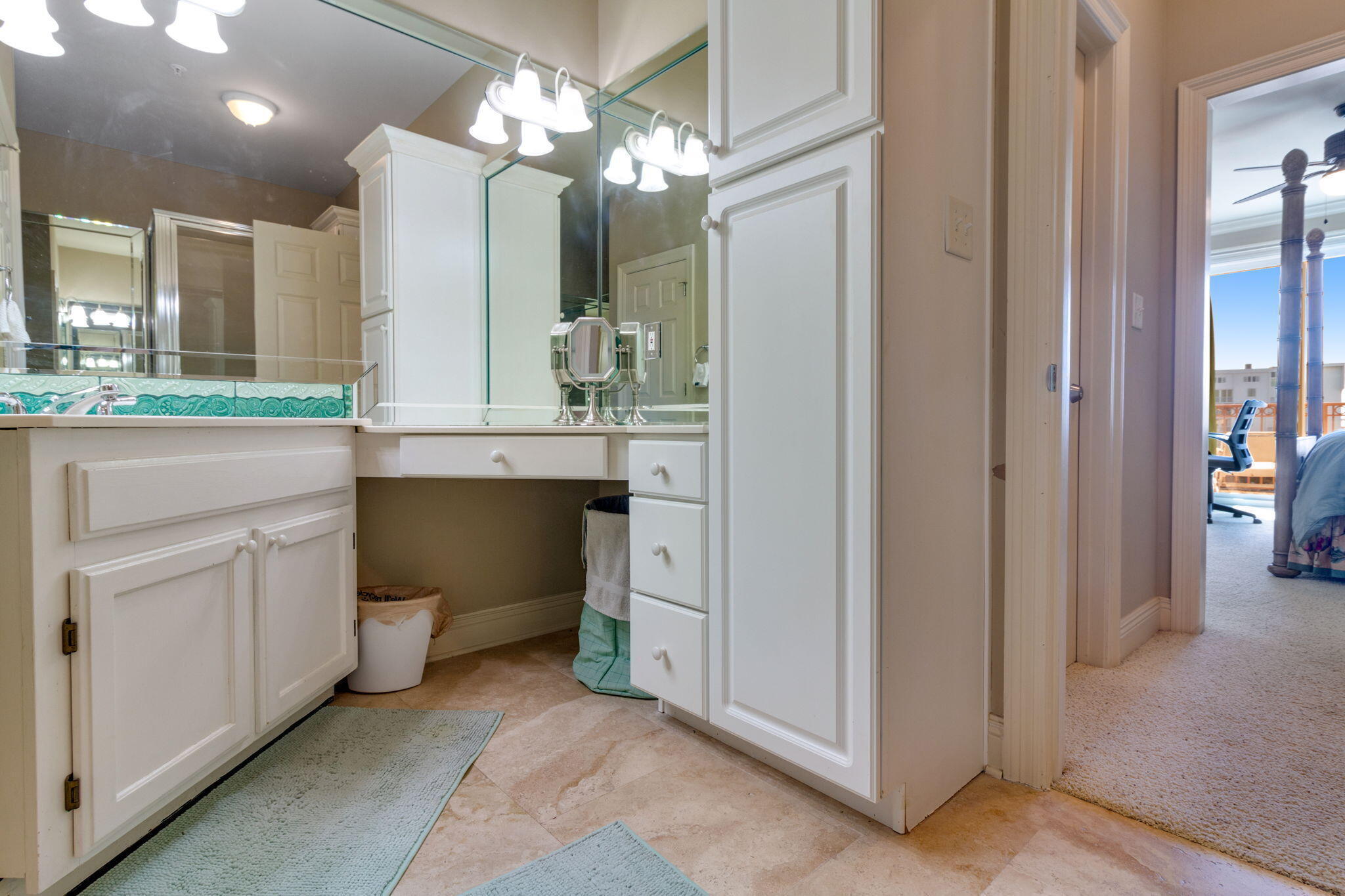 724 Harbor Boulevard, Unit 201 Destin, FL 32541 - Photo 14 of 25 a room with a sink and a mirror