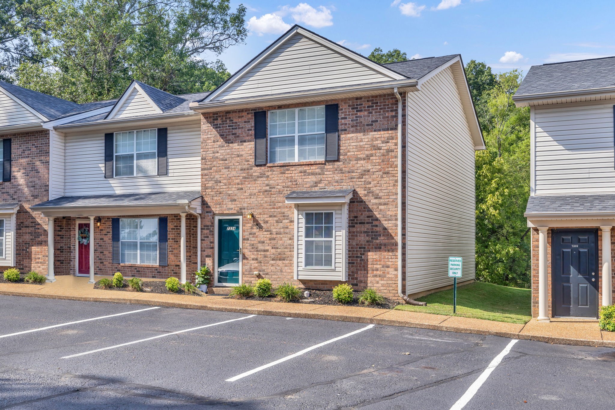 7334 Planters Road Fairview, TN 37062 - Photo 2 of 30 a front view of a house with a yard and garage