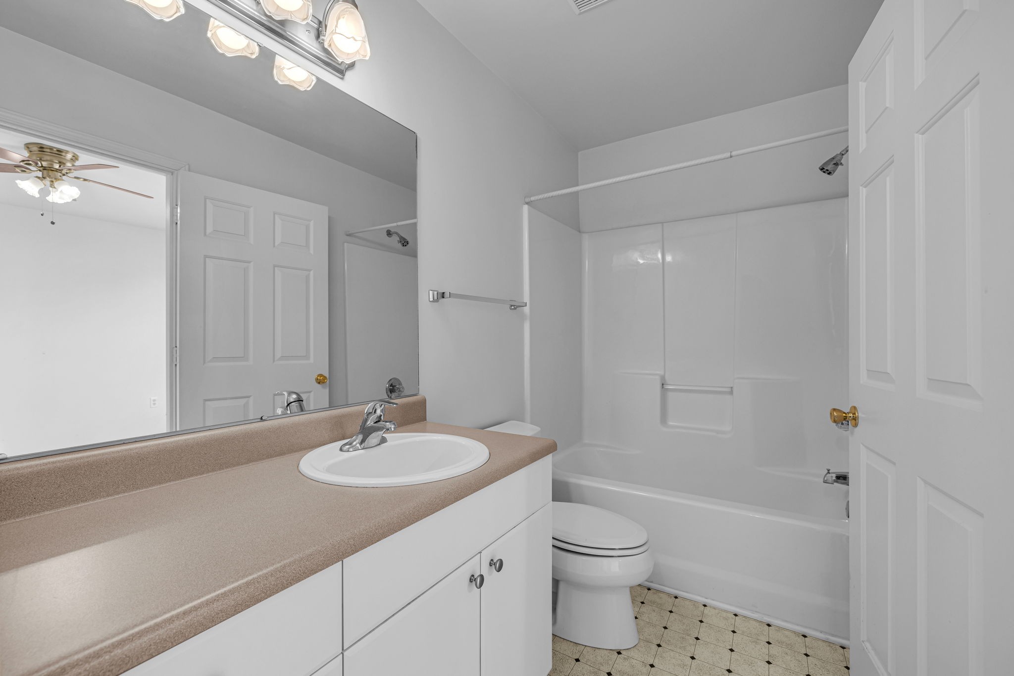 7334 Planters Road Fairview, TN 37062 - Photo 21 of 30 a bathroom with a sink a toilet and shower