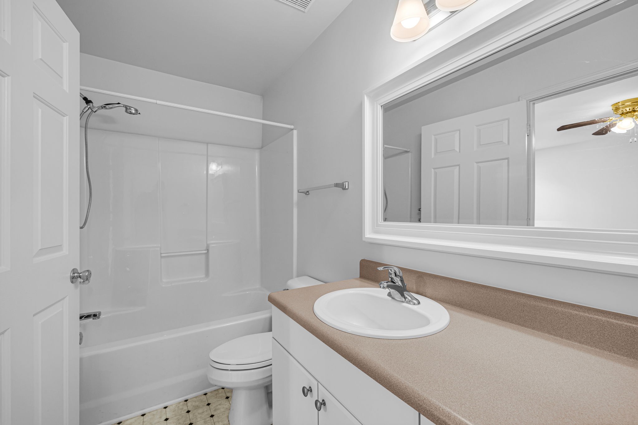 7334 Planters Road Fairview, TN 37062 - Photo 26 of 30 a bathroom with a sink toilet vanity and shower