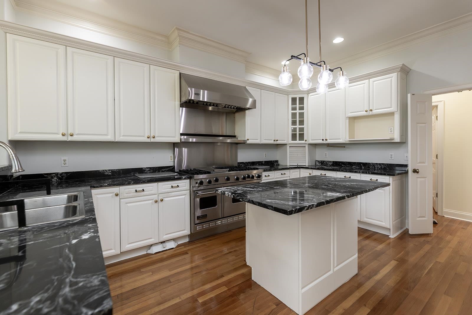 9390 Mayfield Road South Collierville, TN 38017 - Photo 14 of 40 a kitchen with stainless steel appliances granite countertop a stove a sink and a refrigerator