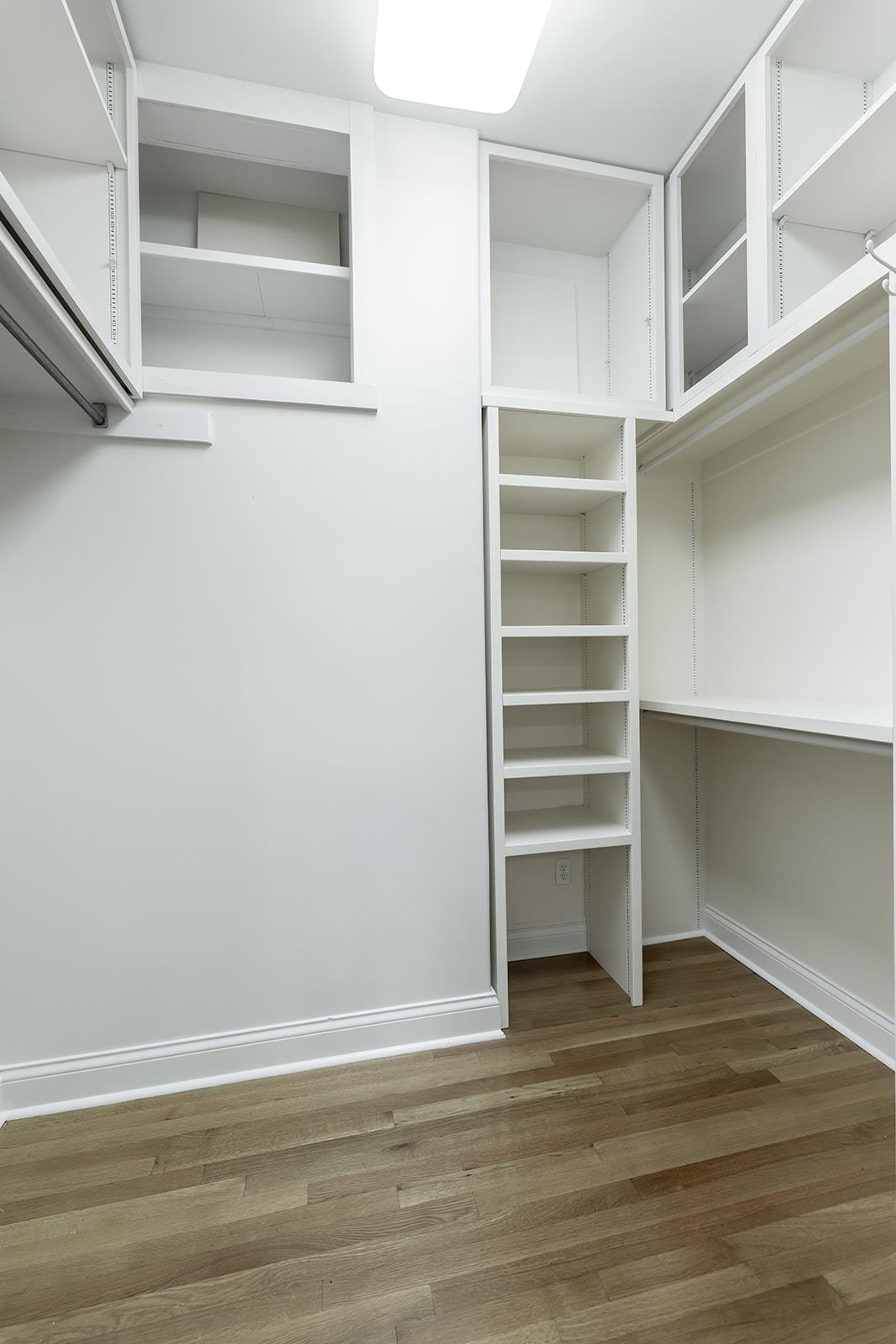 9390 Mayfield Road South Collierville, TN 38017 - Photo 25 of 40 a view of walk in closet with empty racks