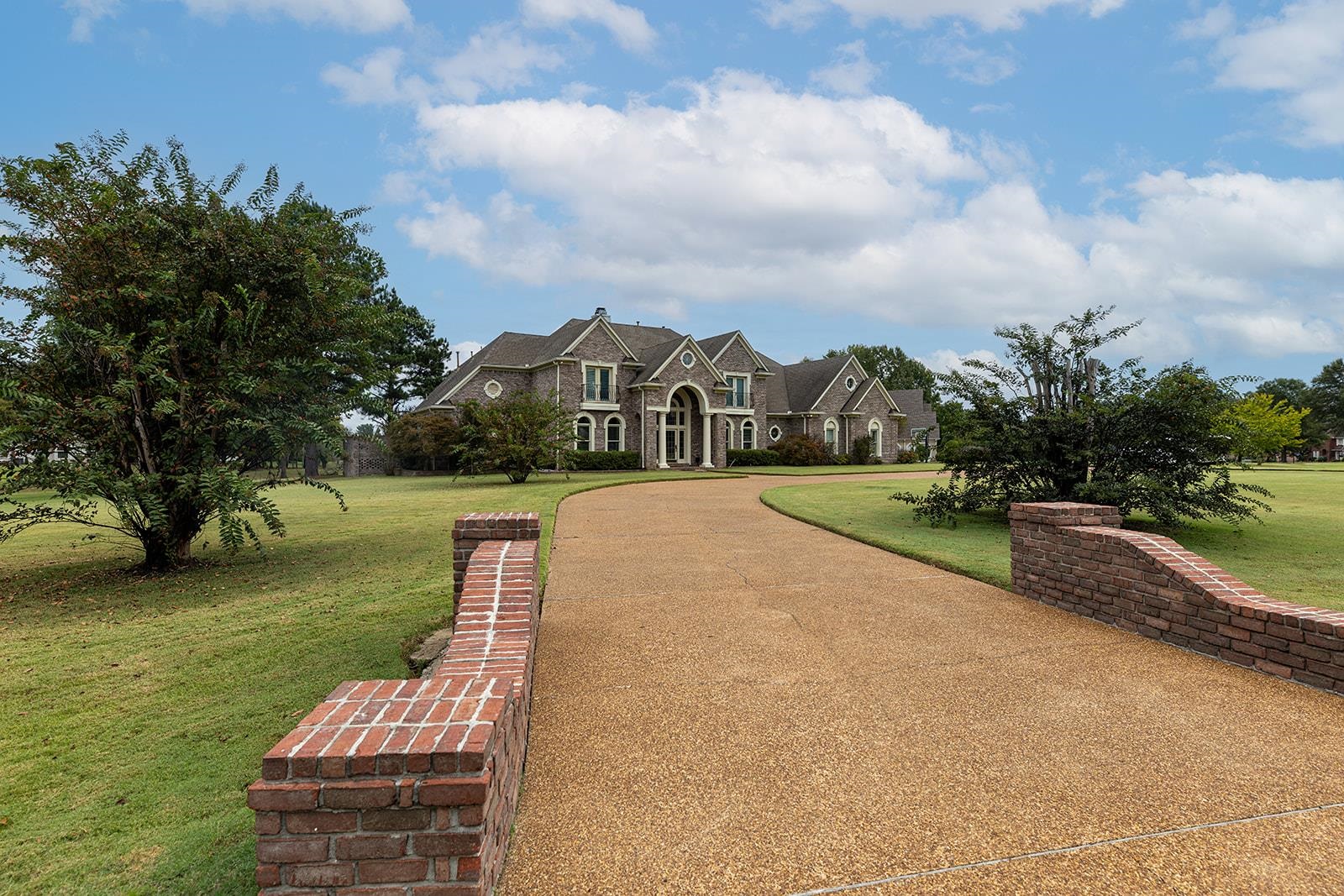 9390 Mayfield Road South Collierville, TN 38017 - Photo 3 of 40 a view of a garden with a lake view