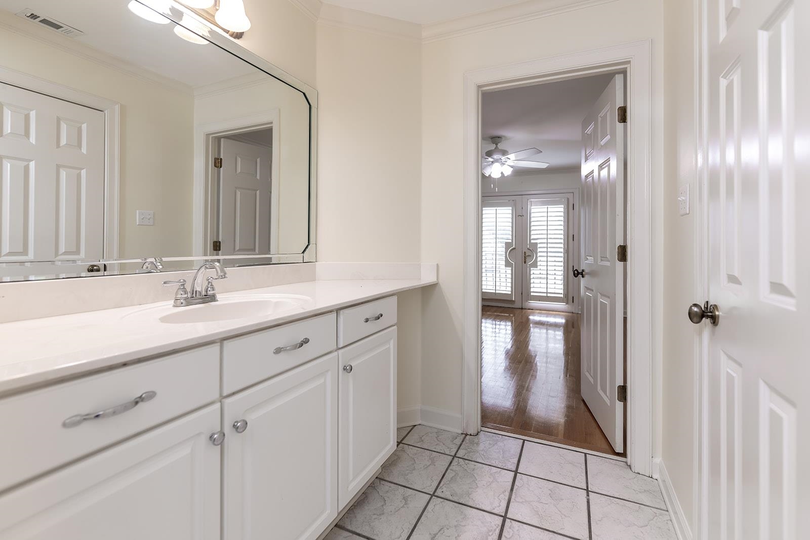 9390 Mayfield Road South Collierville, TN 38017 - Photo 31 of 40 a spacious bathroom with a shower a sink and a mirror