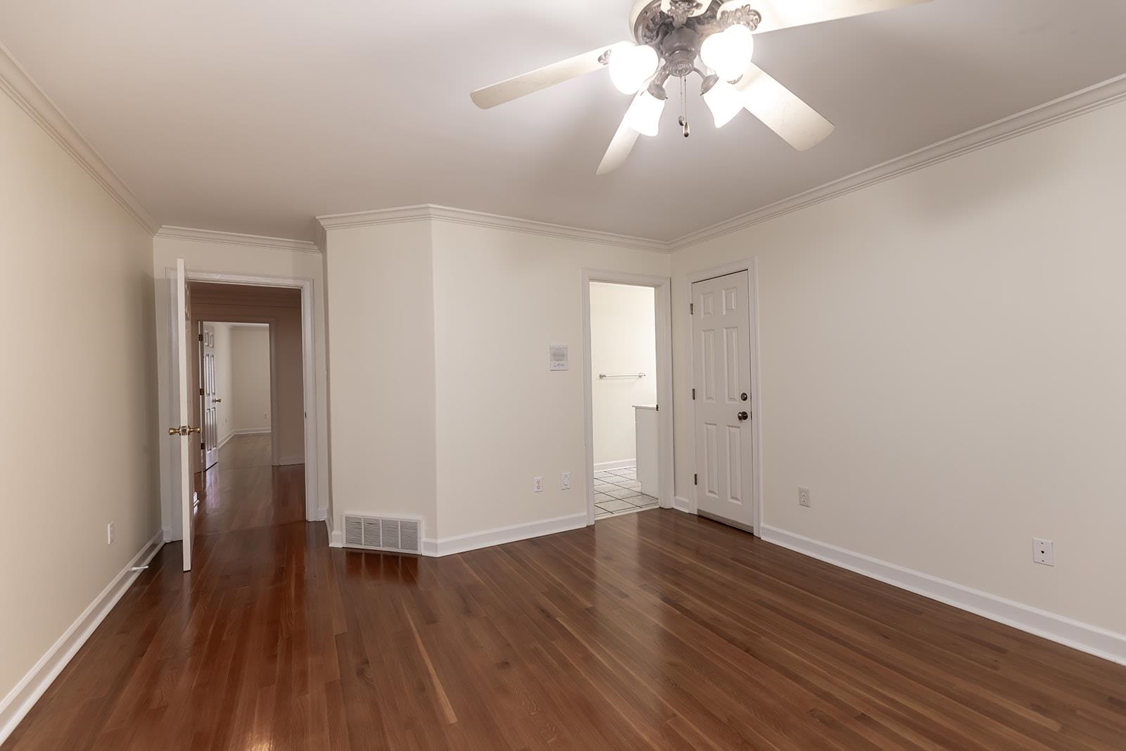 9390 Mayfield Road South Collierville, TN 38017 - Photo 32 of 40 a view of a room with wooden floor and a ceiling fan
