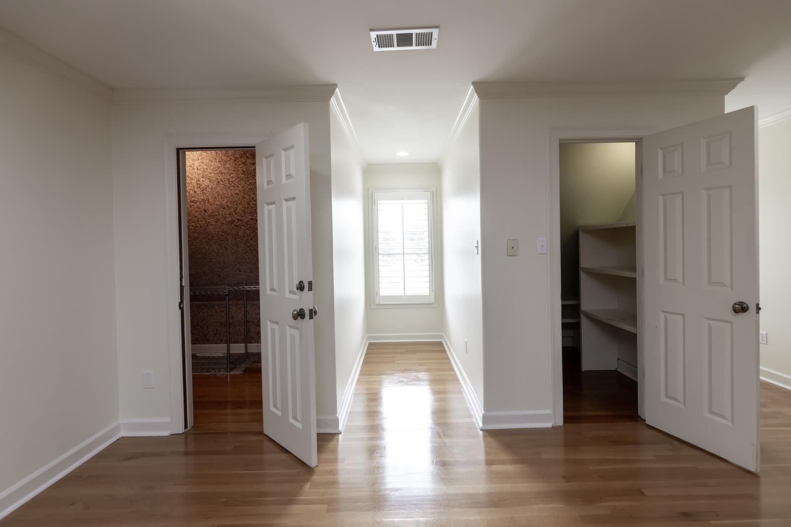 9390 Mayfield Road South Collierville, TN 38017 - Photo 39 of 40 an empty room with wooden floor & closet and mirror