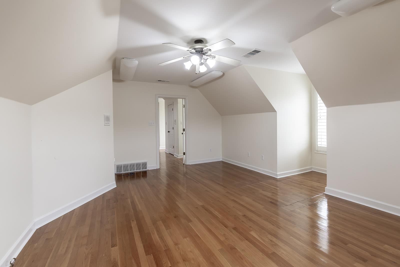 9390 Mayfield Road South Collierville, TN 38017 - Photo 40 of 40 wooden floor in an empty room with a window