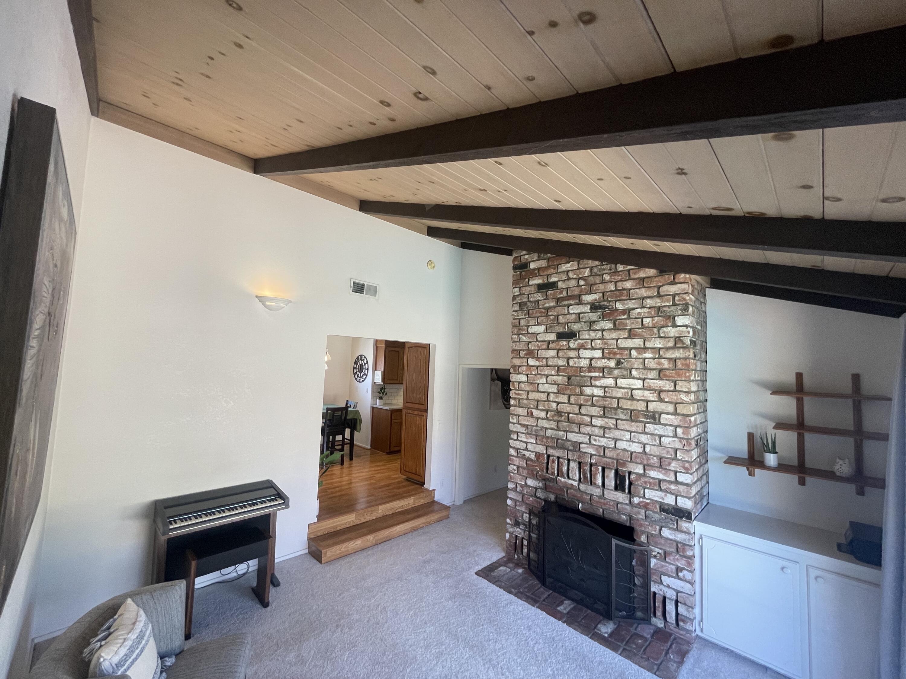 4170 Meander Drive Redding, CA 96001 - Photo 14 of 50 a view of room with window and fireplace