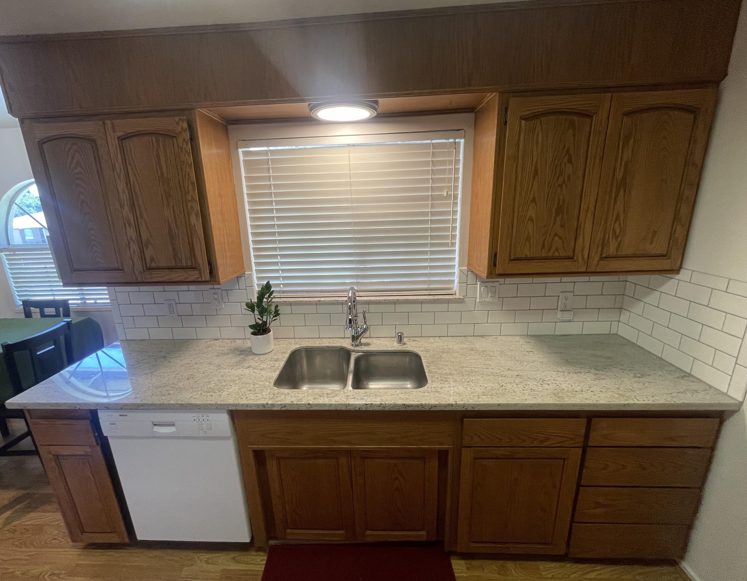 4170 Meander Drive Redding, CA 96001 - Photo 21 of 50 a kitchen with a sink and cabinets