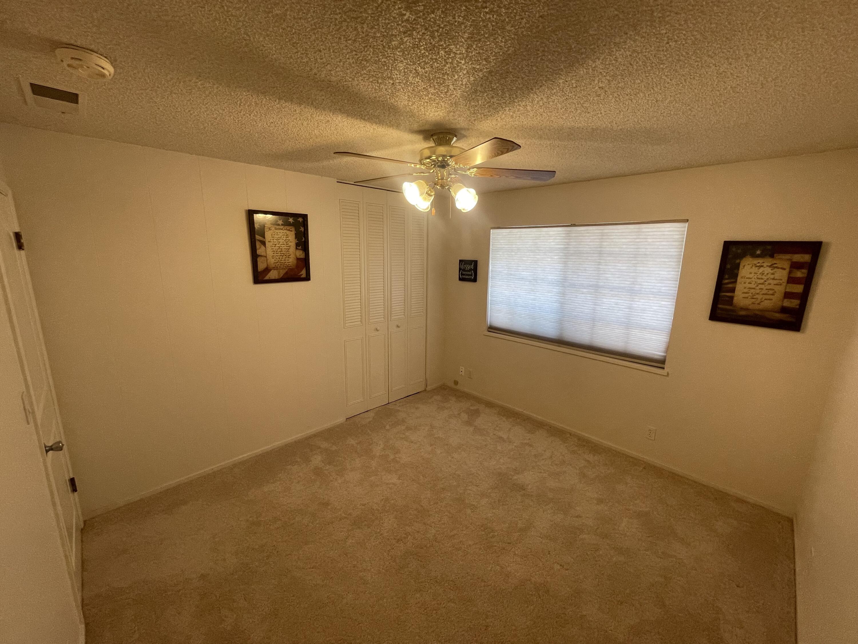 4170 Meander Drive Redding, CA 96001 - Photo 31 of 50 an empty room with a fan & a ceiling fan