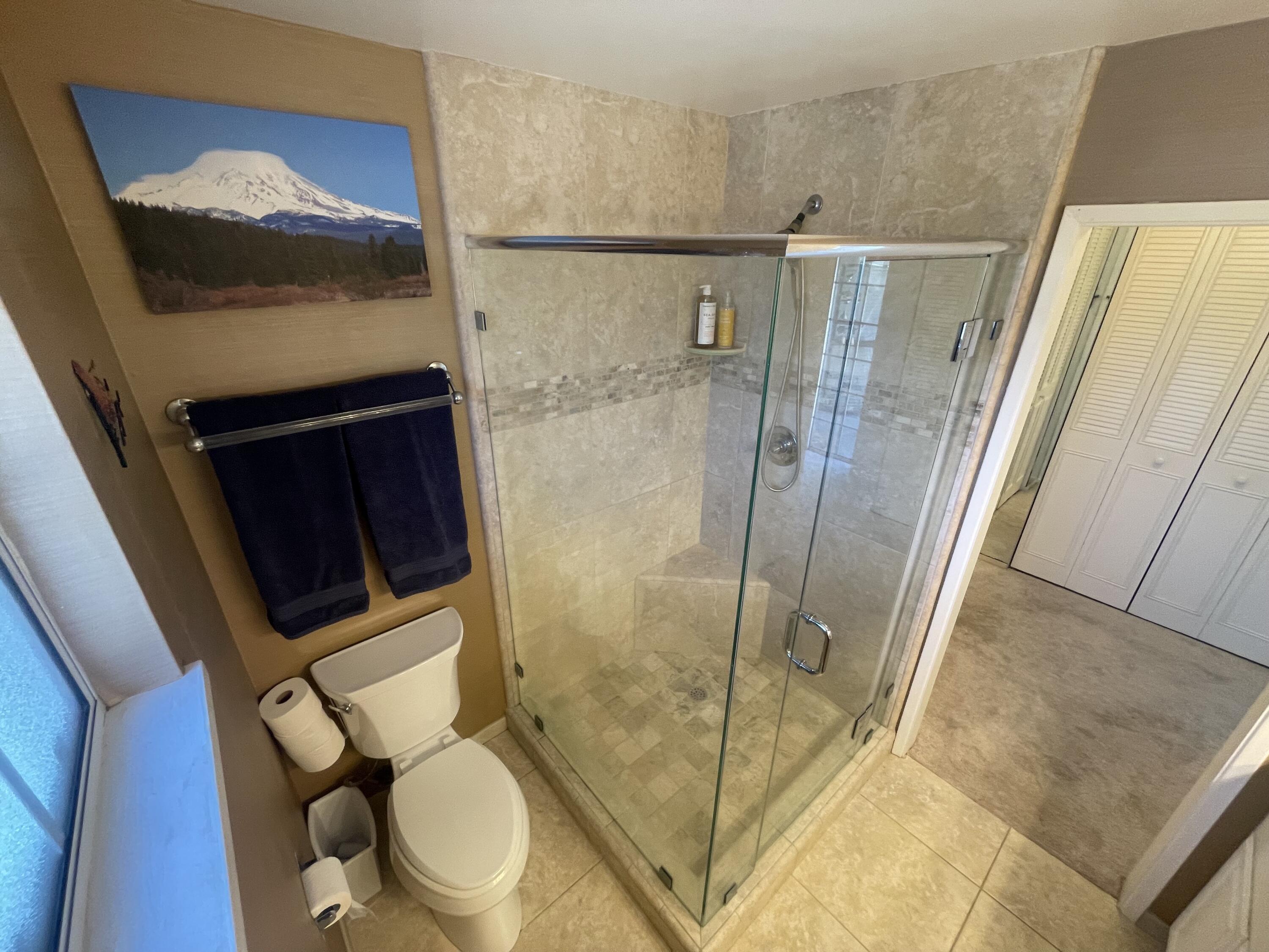 4170 Meander Drive Redding, CA 96001 - Photo 39 of 50 a bathroom with a toilet and a shower