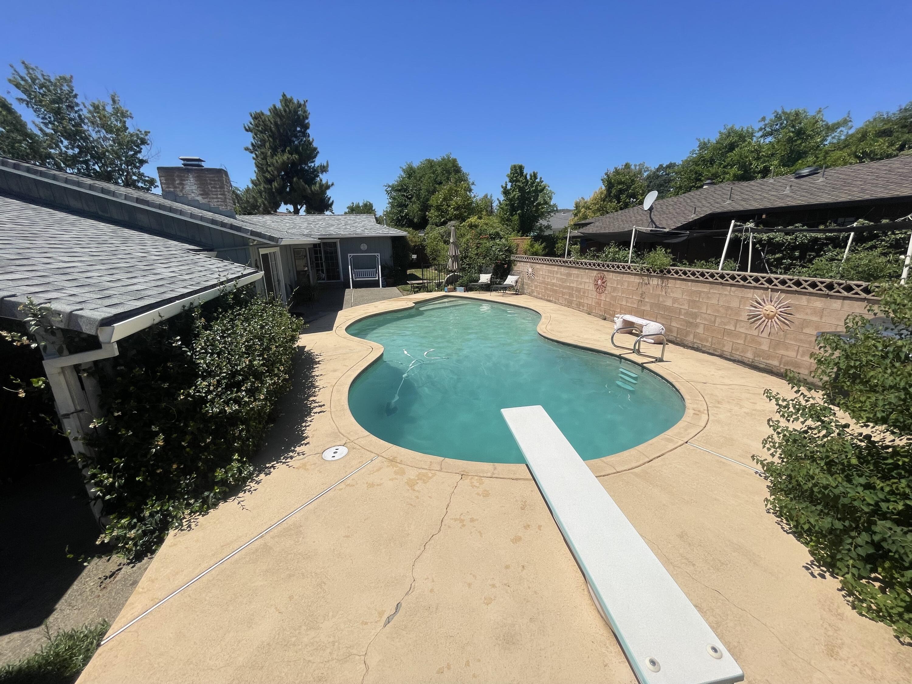 4170 Meander Drive Redding, CA 96001 - Photo 45 of 50 a view of a swimming pool with a patio