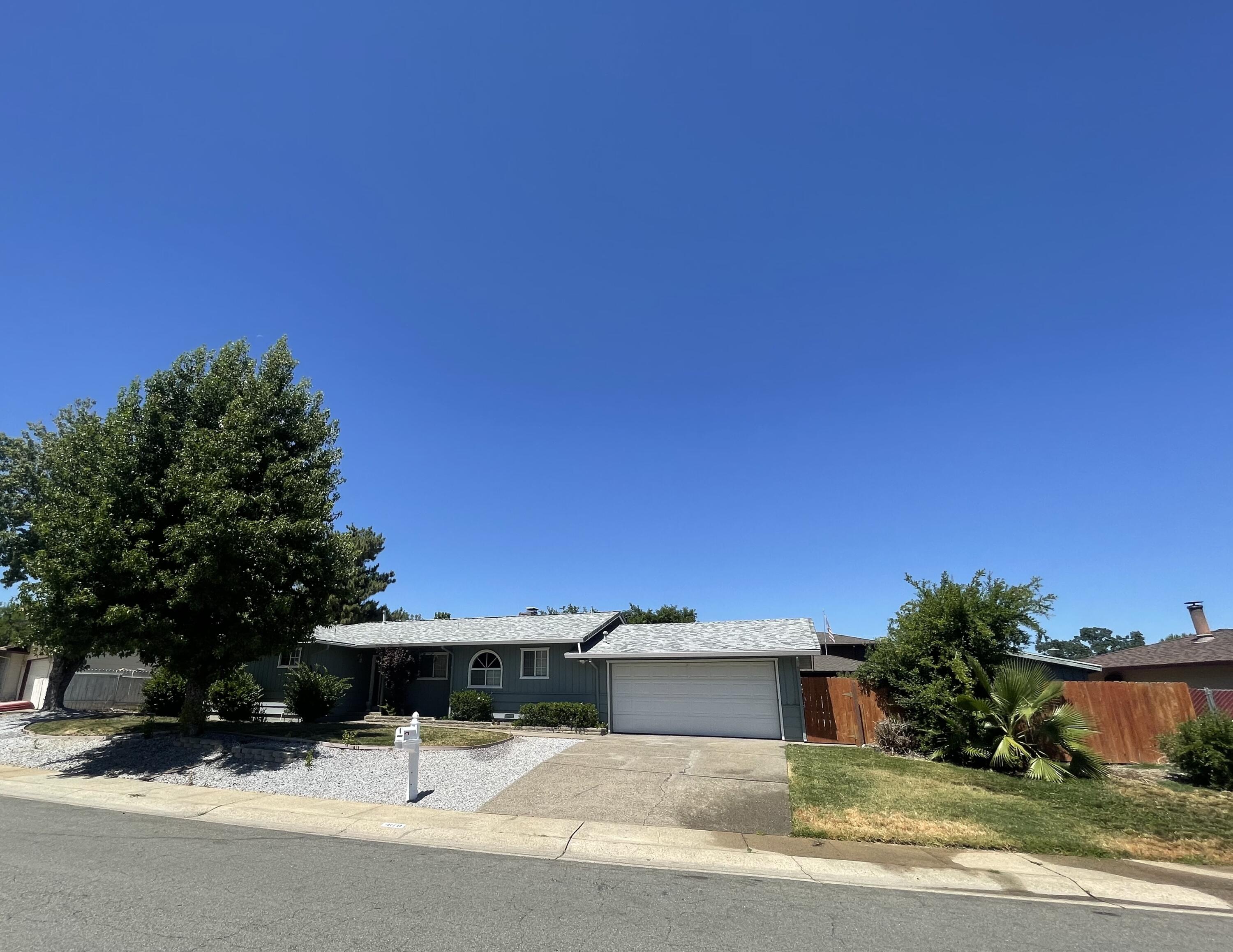 4170 Meander Drive Redding, CA 96001 - Photo 5 of 50 a view of a yard with cars