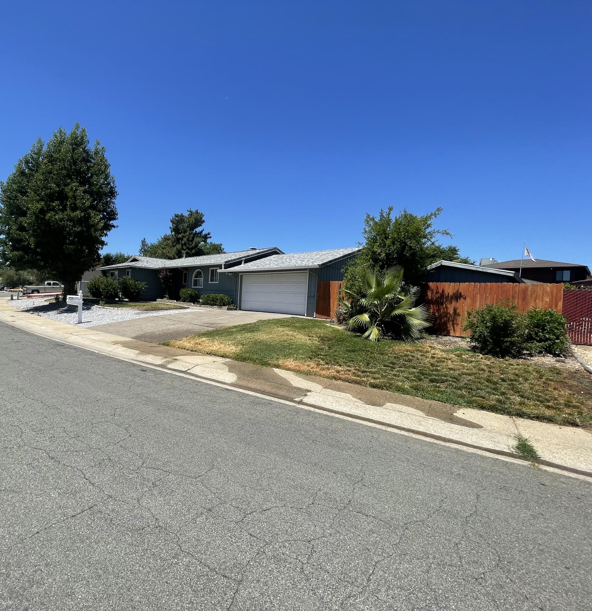 4170 Meander Drive Redding, CA 96001 - Photo 6 of 50 a view of house with outdoor space and yard