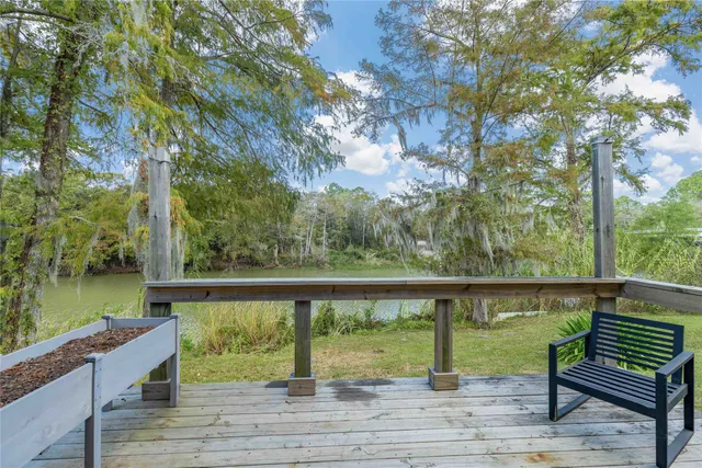 a view of a chairs and table in a patio