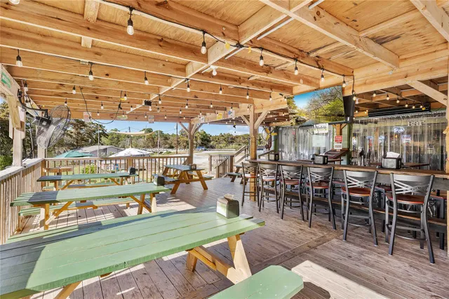 a view of a swimming pool with a patio