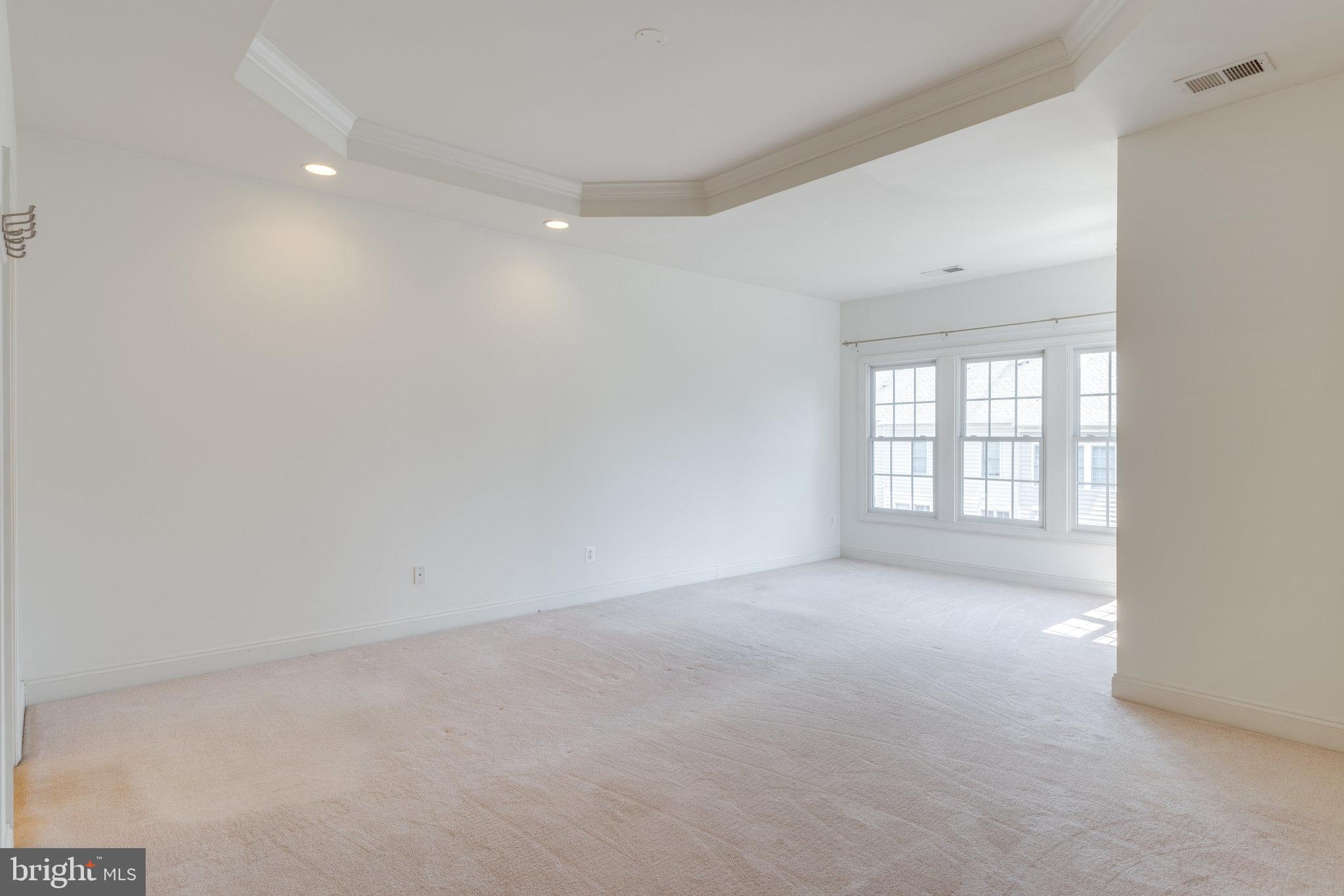 6884 Witton Circle Gainesville, VA 20155 - Photo 17 of 40 a view of an empty room with a window