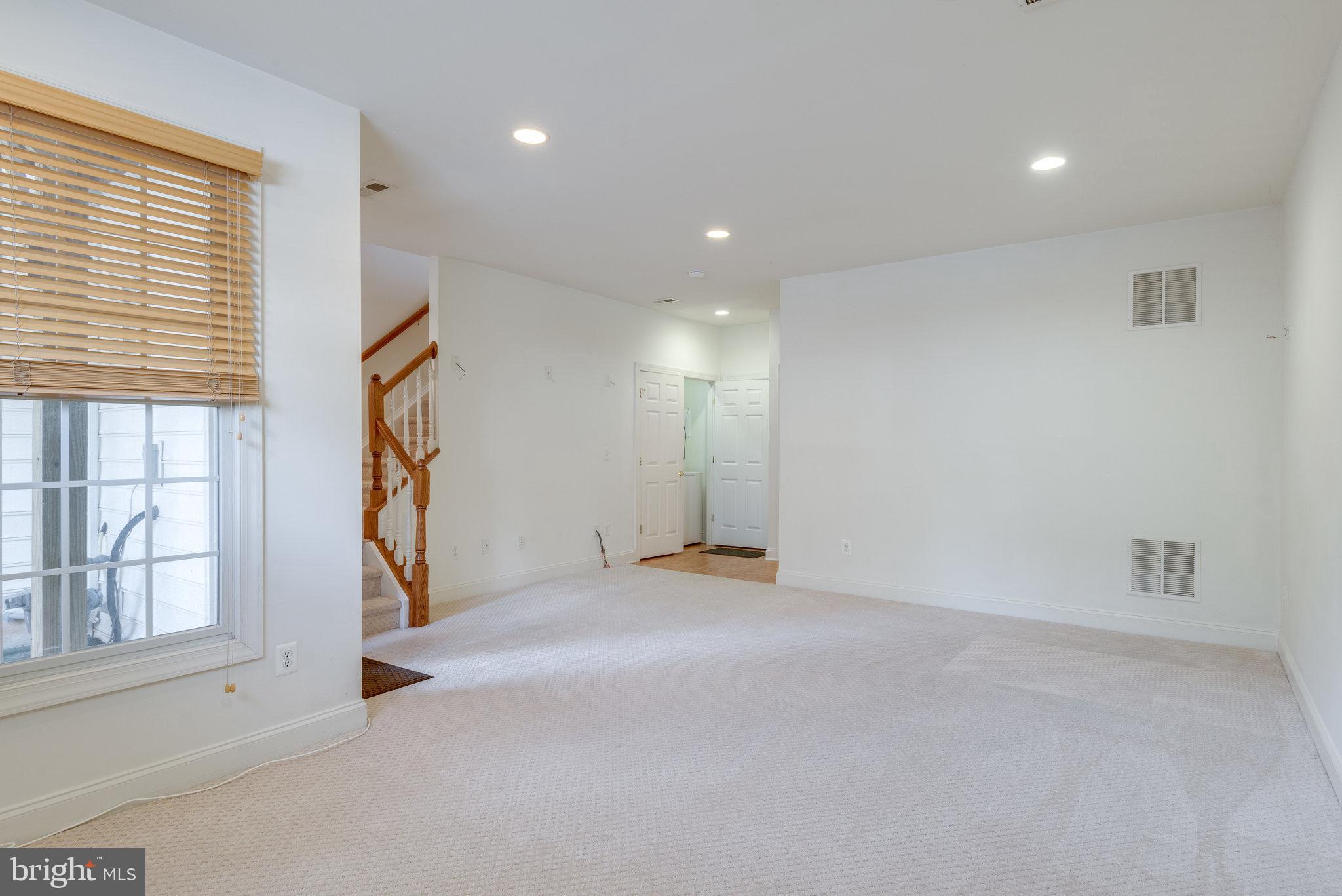 6884 Witton Circle Gainesville, VA 20155 - Photo 25 of 40 a view of an empty room with a window