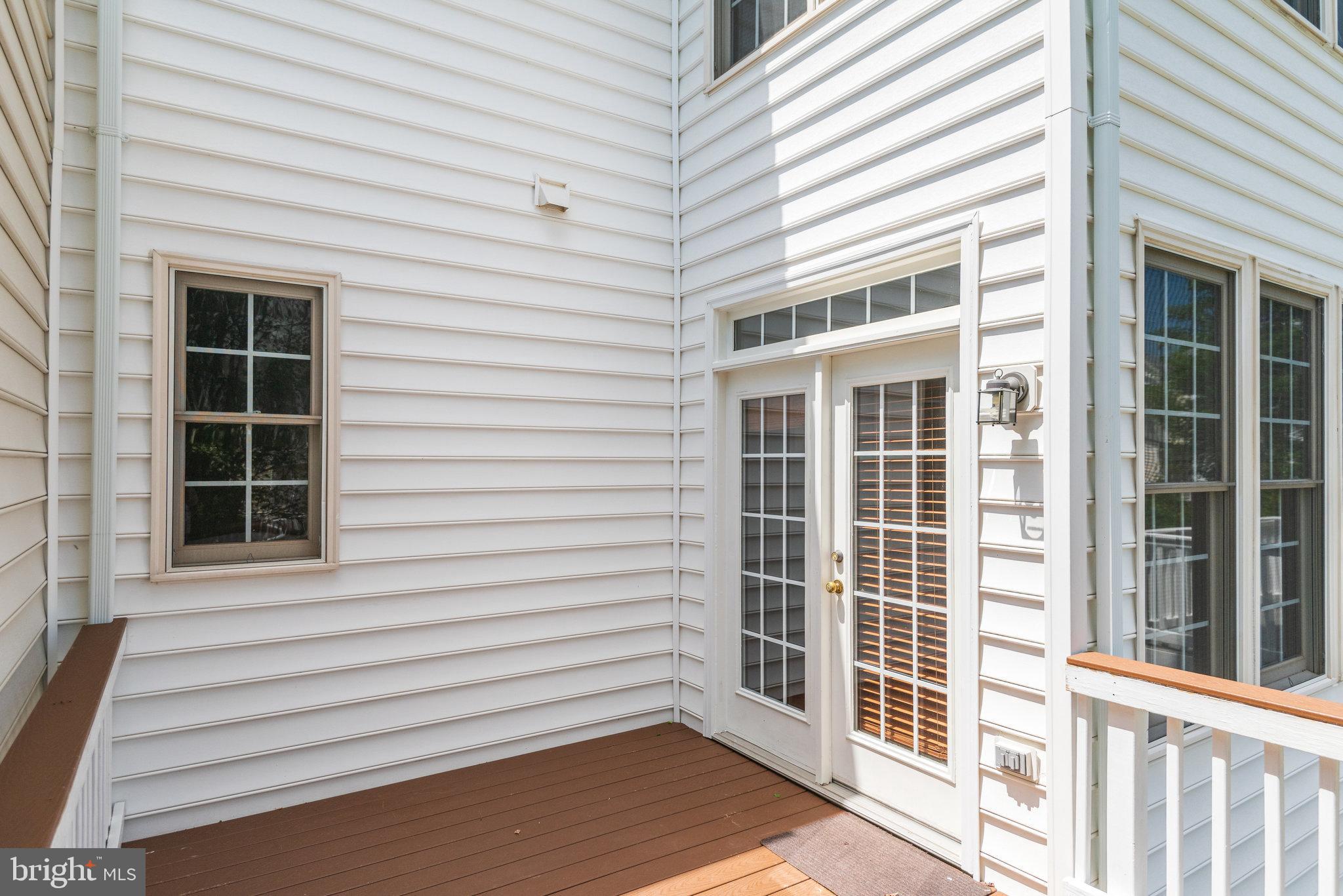 6884 Witton Circle Gainesville, VA 20155 - Photo 30 of 40 a view of a house with a large window