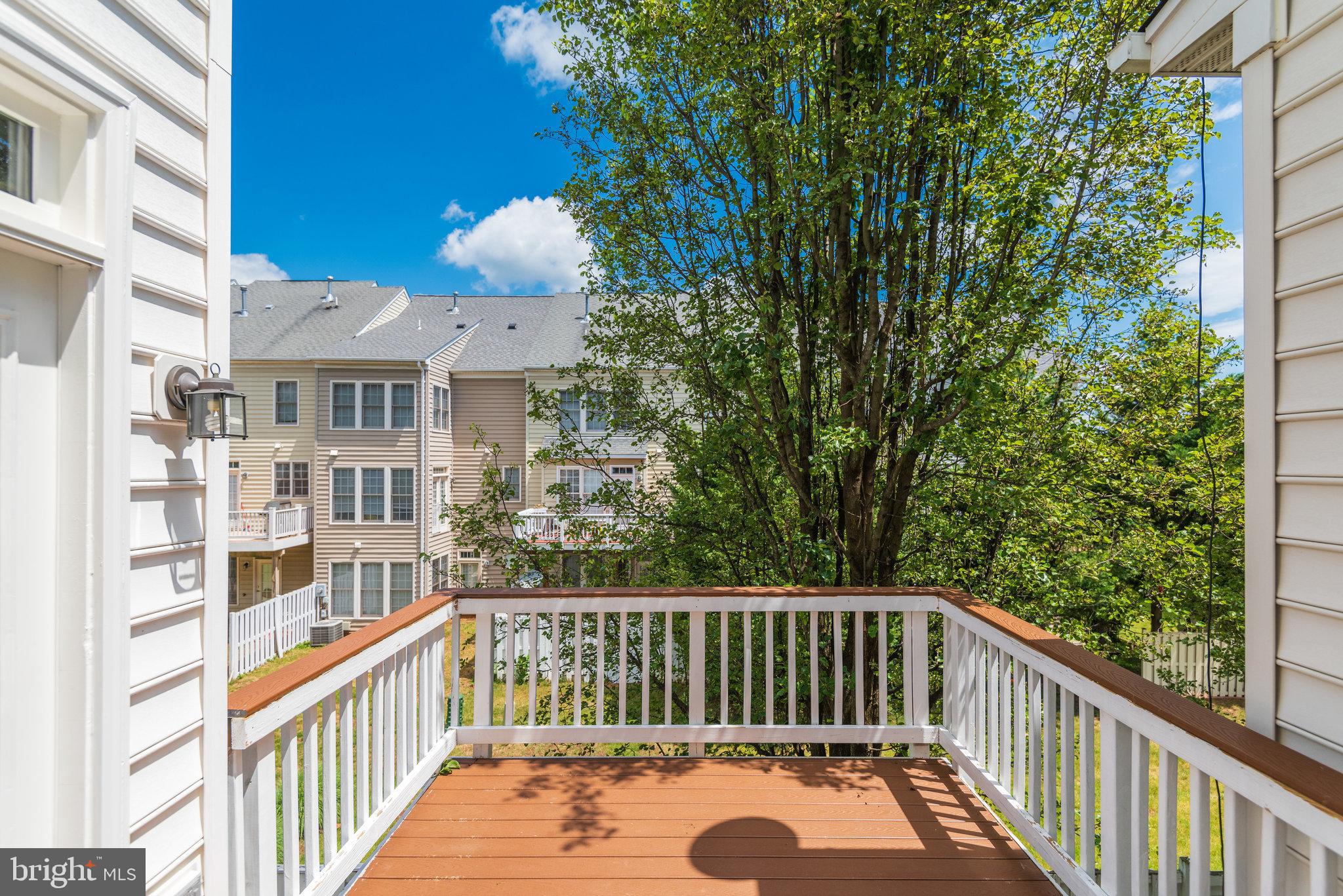 6884 Witton Circle Gainesville, VA 20155 - Photo 31 of 40 a view of a houses with a balcony
