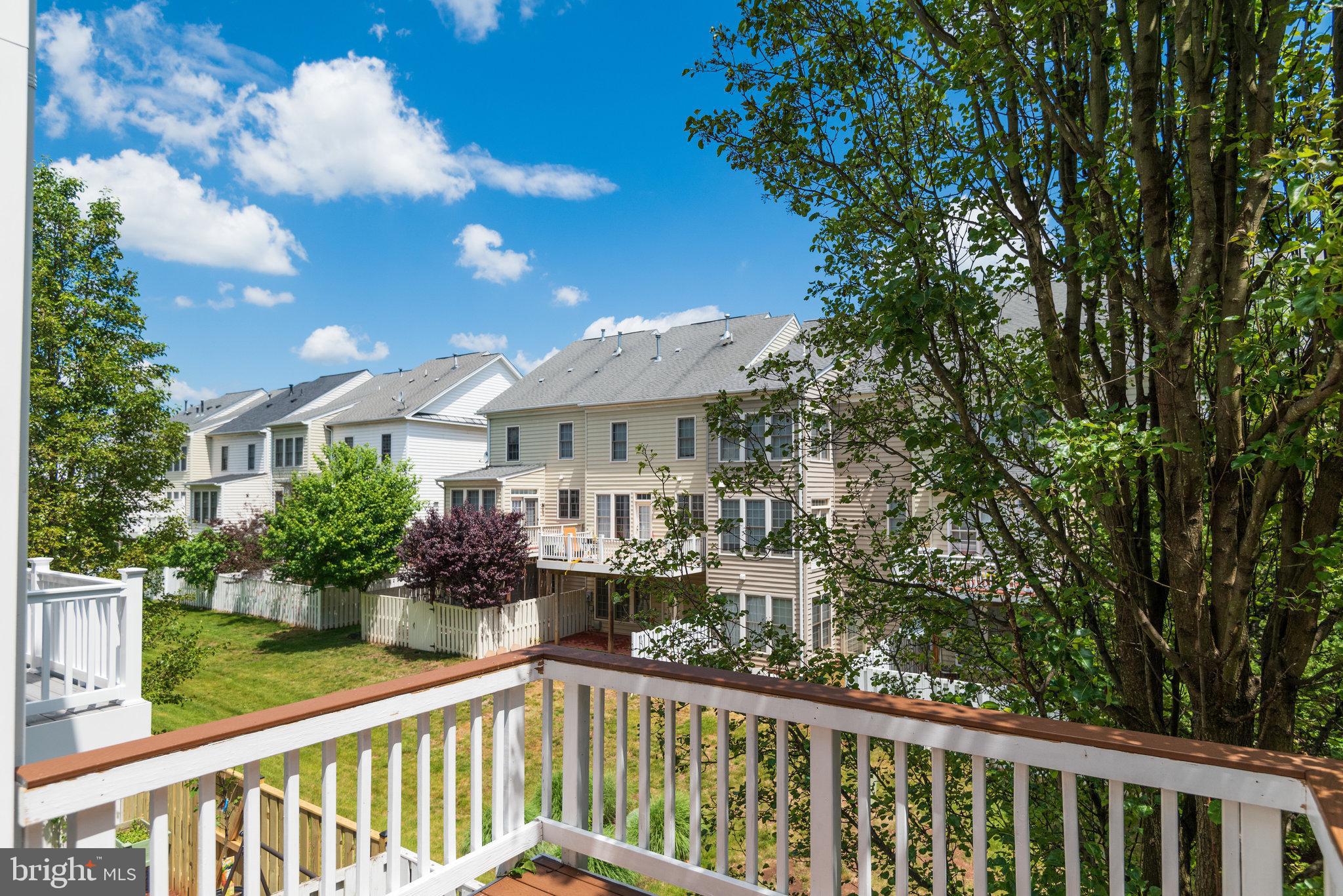 6884 Witton Circle Gainesville, VA 20155 - Photo 33 of 40 a view of a houses with cars from a balcony