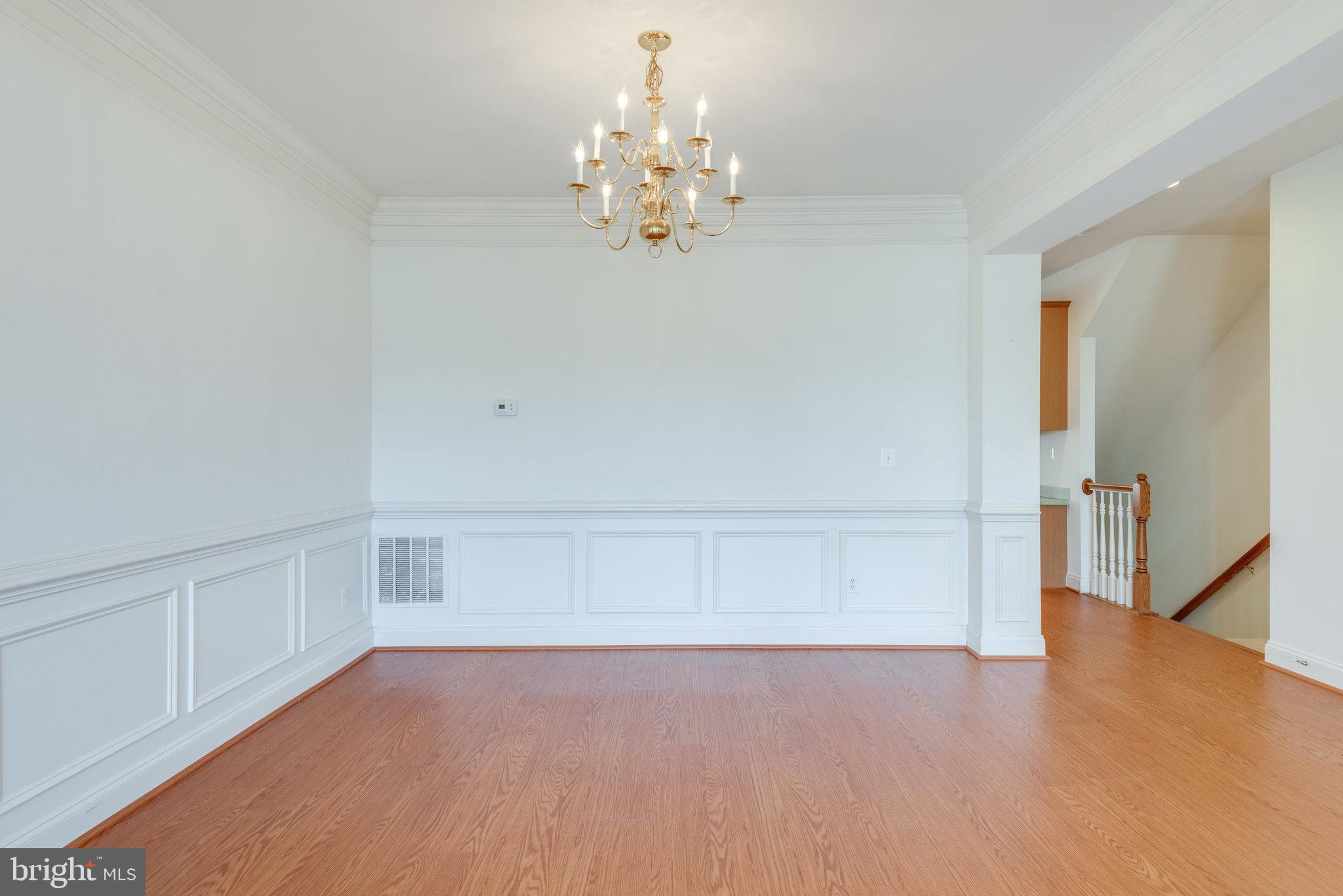 6884 Witton Circle Gainesville, VA 20155 - Photo 6 of 40 a view of an empty room with a window